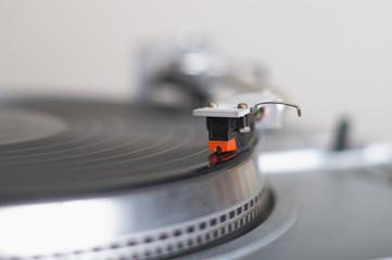 turntable tone-arm cartridge is playing disk