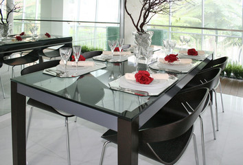 Showroom with 6 seater dinning table with cutlery setting