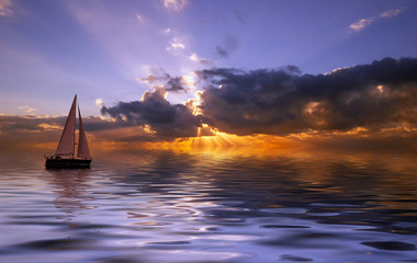 Fototapeta na wymiar sailing at sunset