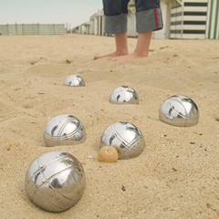 playing a ball game on the beach