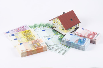 banknotes with model house