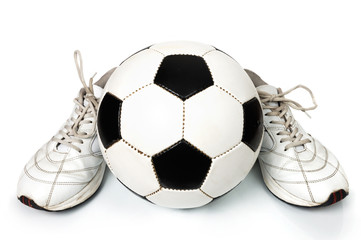 pair of sneakers and soccer ball