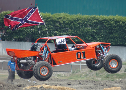 orange sand car in air
