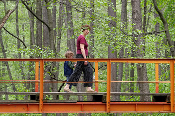 mum and son on the bridge