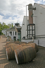 whisky barrels at distillery in scotland uk