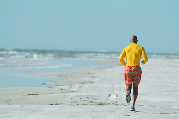 running man jogging course plage - obrazy, fototapety, plakaty