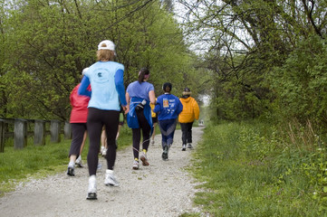 jogging runners on trail