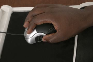 Fototapeta premium man hands on computer mouse 1