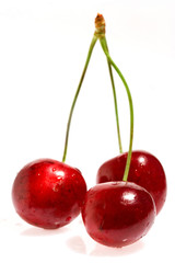 Fototapeta na wymiar three cherries