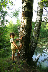 the boy in a forest.