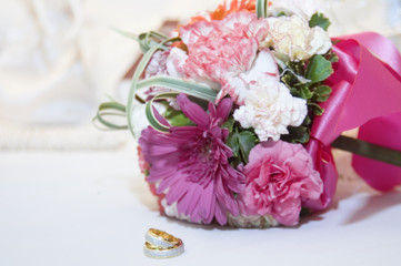 wedding ring and bouquet