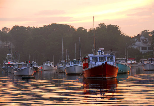 Fototapeta fishing boats at sunset