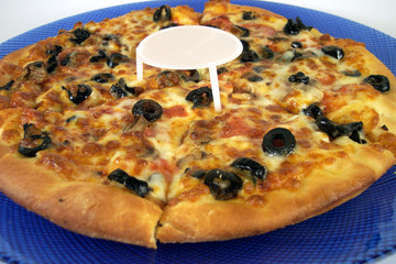 plastic protector on pizza