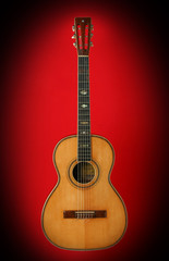Fototapeta na wymiar guitar over red background