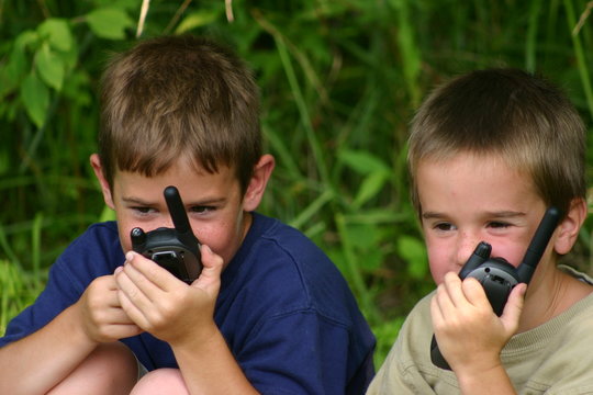 two boys on walkie talkies