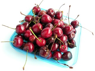 Fototapeta na wymiar handful of sweet cherries