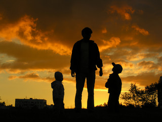 father with children sunset 2