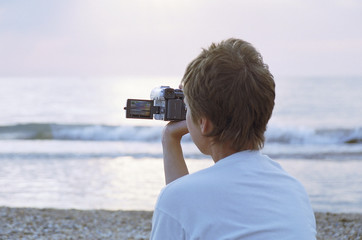 woman shooting by camcorder
