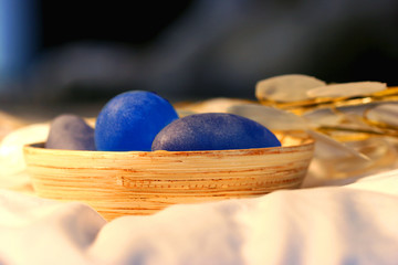 blue and purple rocks in decorative bowl