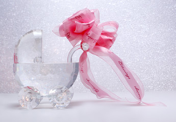 crystal baby carriage with pink bow