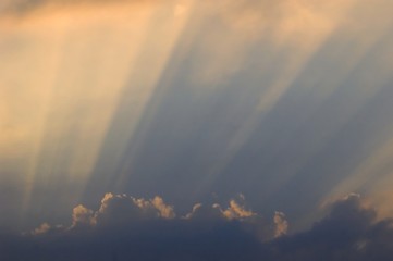 sunrays through clouds