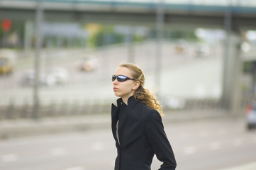 business woman near the road