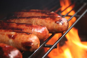 Fotobehang brats on the grill © aceshot