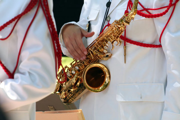 playing saxophone
