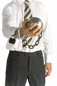 chained businessman