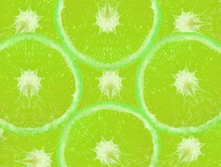 Papier Peint photo Lavable Tranches de fruits fond de citron vert