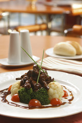 the beef liver with broccoli and a cauliflower