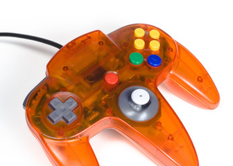 orange game controller close-up © Alysta