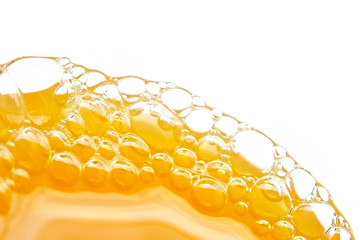 bubbles of orange juice © OlgaLIS
