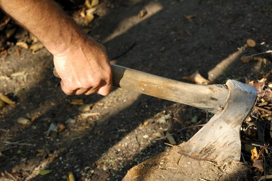 hand with axe