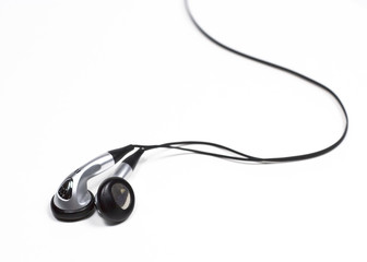 silver ear bud headphones