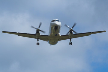 white plane aircraft landing at edinburgh airport