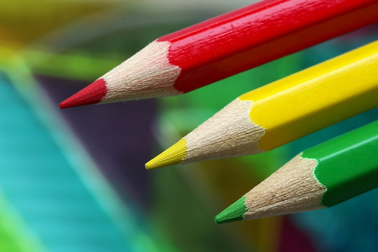color pencils on a rulers background