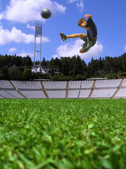 boy playing soccer