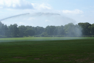 water sprinkle blue sky