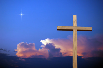 cross and colorful sky