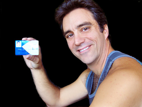 man showing credit card