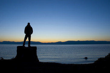 man in front on lake