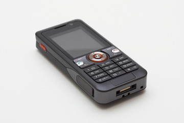 modern old style mobile phone on white background