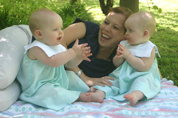 young mother with twins