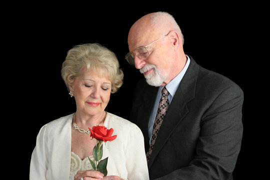 Senior Couple On Black - Romantic Gesture