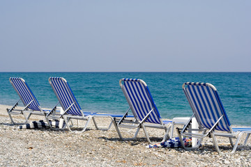 four beach chairs