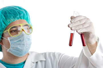 medical technician examining blood