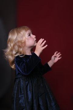 happy little girl in party dress