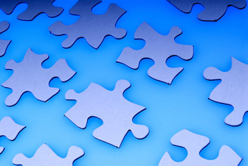 puzzle pieces on blue