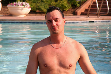 guy in the pool on vacation